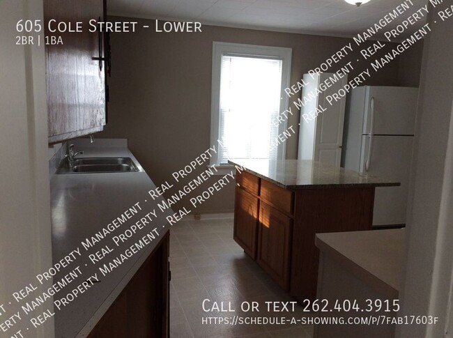 Building Photo - Spacious two bedroom lower unit.