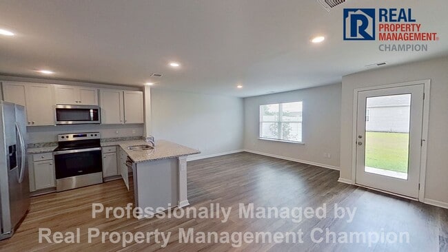 Building Photo - Like New 3 BD/2.5 BA Townhouse w/Open Floorplan and Attached Garage