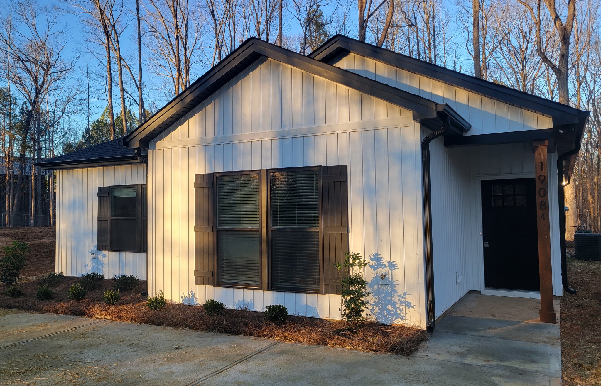 2 bedroom front right side covered porch entrance of duplex - 1908 Charles Raper Jonas Hwy