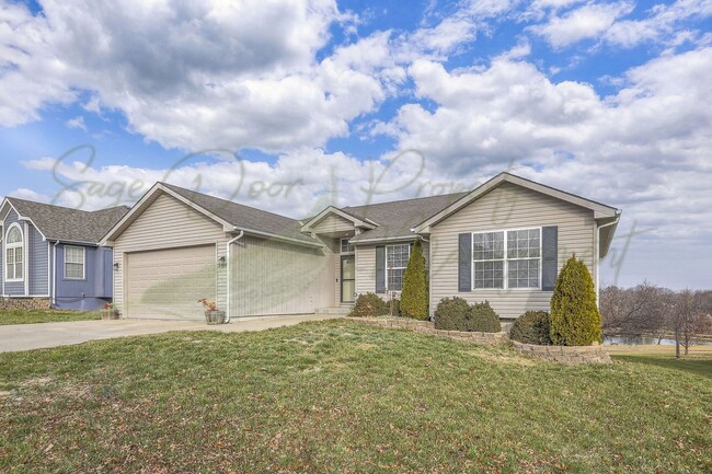 Building Photo - STUNNING GRAIN VALLEY HOME!!!