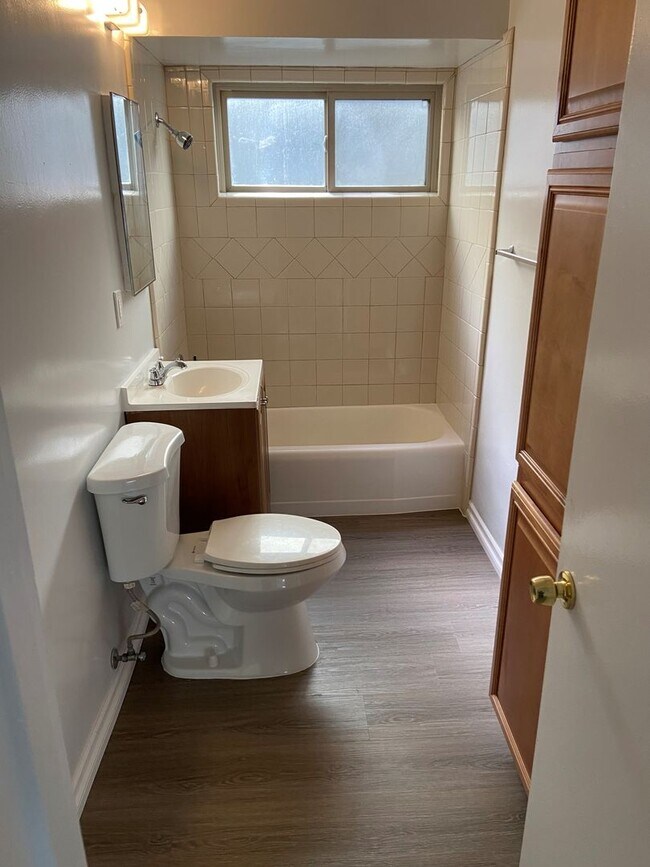 Building Photo - 1/2 OFF FIRST MONTH'S RENT  Remodeled studio apartment with all utilities paid!