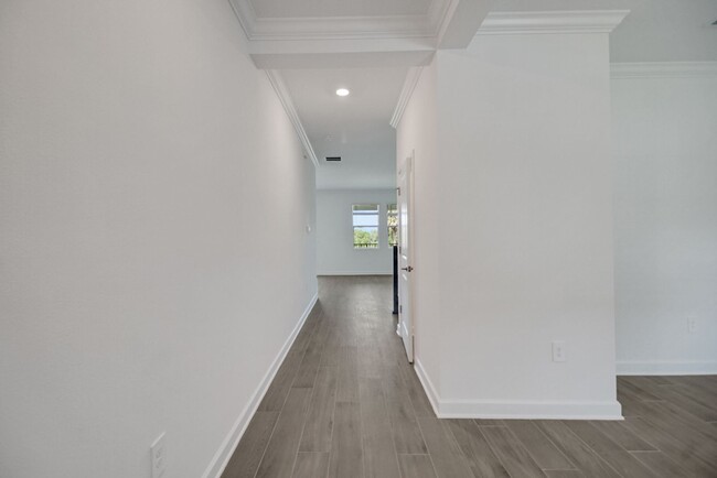 Building Photo - Stunning 4/3 in Gated Dora Parc! Water Views!