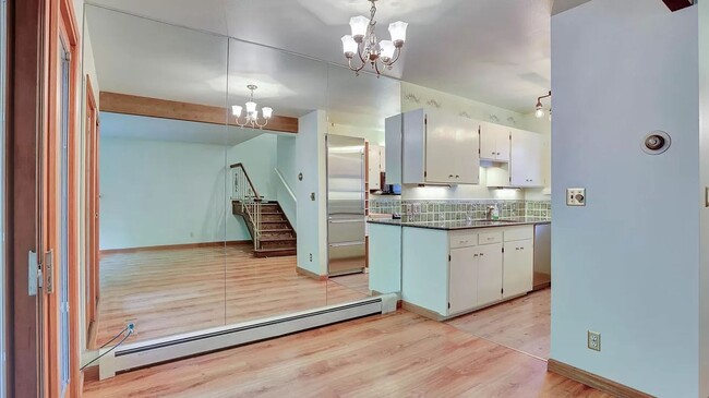 Building Photo - Spacious split level condo