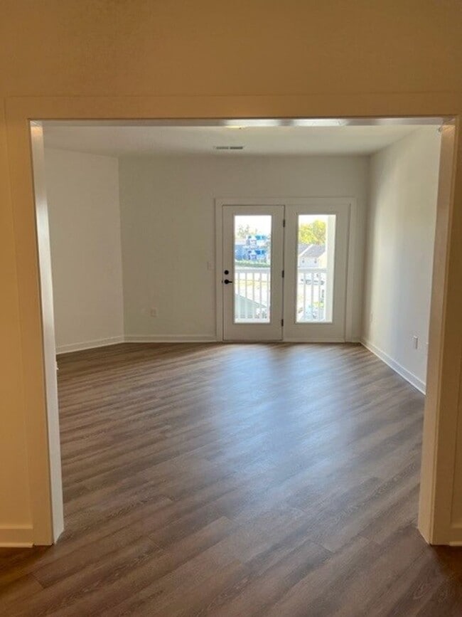 Building Photo - Beautiful New Construction in Gated Community within Minutes to Downtown!