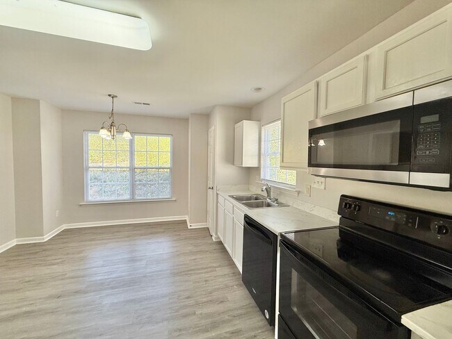 Building Photo - Updated 4BD, 2.5BA Raleigh Home With Easy ...