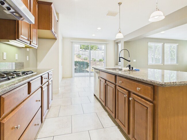 Building Photo - Spacious 5-Bedroom Solar Home in Blackstone with Resort Style Amenities