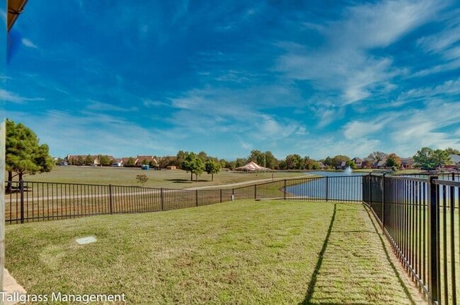Building Photo - 2/2/2 Patio Home With Pond View!