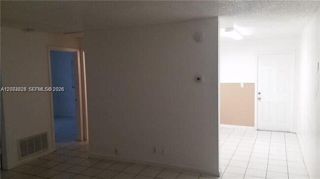 Building Photo - 5880 NW 19th Ct