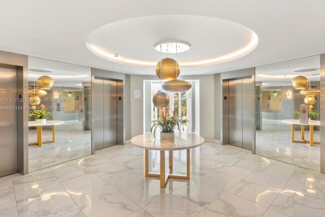 Building Photo - 10275 Collins Ave