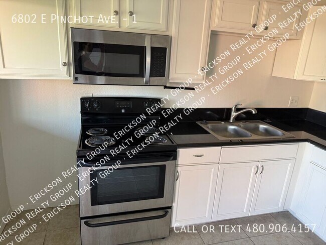 Building Photo - 6802 E Pinchot Ave