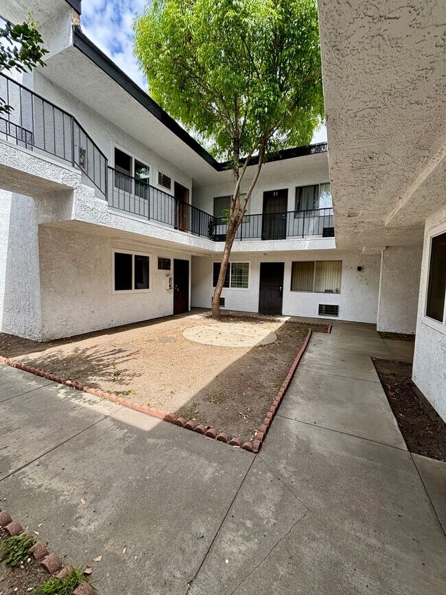 Building Photo - 10635 Sherman Grove Ave