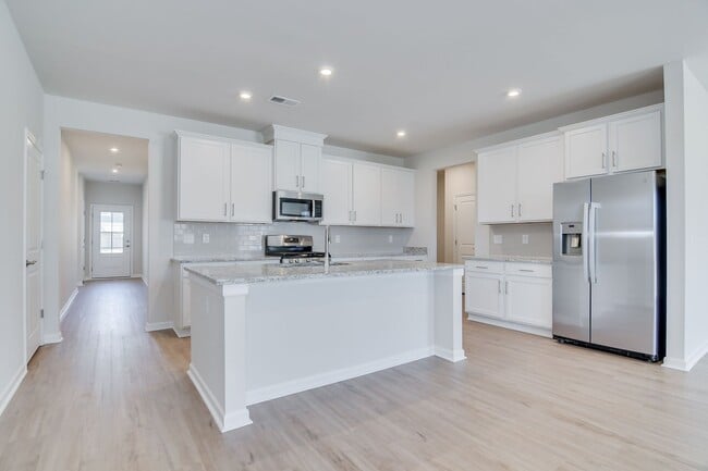 Building Photo - Stunning 4-Bedroom, 3-Bath New Construction Home with Master on Main and Upstairs Retreat