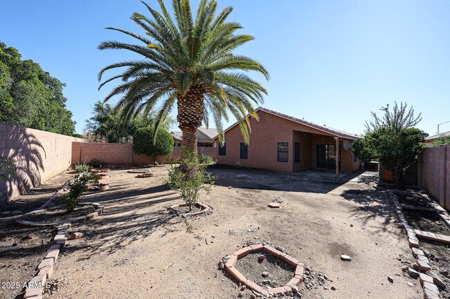 Building Photo - 8672 W Mauro Ln