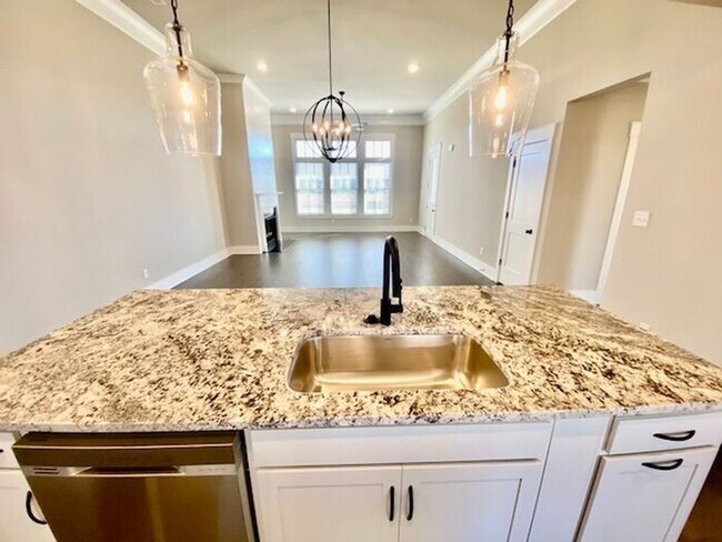 Building Photo - Clift Farm townhome with a fence and 3 car garage