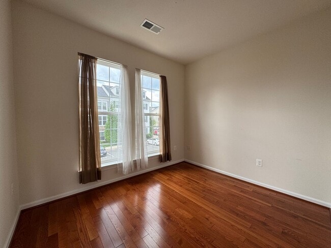 Building Photo - Stylish 3 Bed 3 Bath Townhome With Patio A...