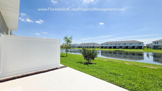 Building Photo - OUTSTANDING BRAND NEW TOWNHOME MOVE IN READY! AZARIO TOWNHOMES LWR !