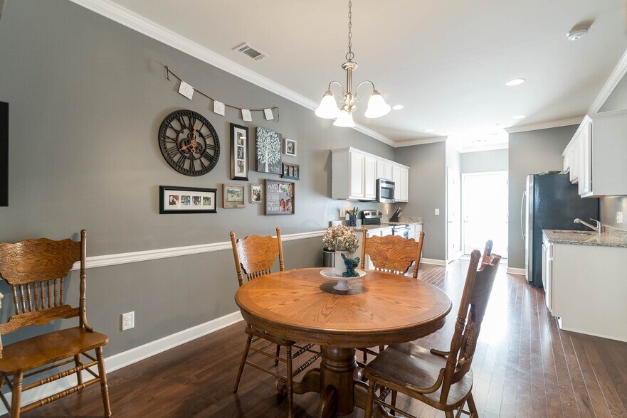 Dining area that connects to both the living room and the kitchen. - 1040 Charlie Daniels Pkwy
