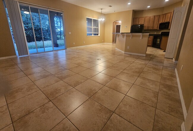 Oversized family room that opens to back patio - 3615 Soft Breeze Cir