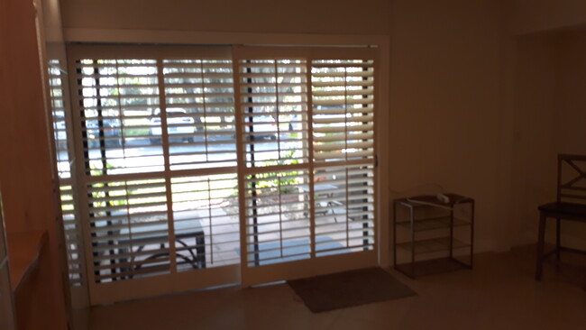 Bahama shutter sliding doors - 441 N Harbor City Blvd