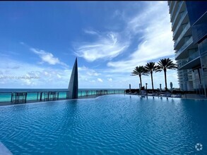 Building Photo - 17121 Collins Ave