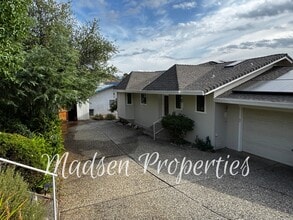 Building Photo - 6367 Woodman Dr