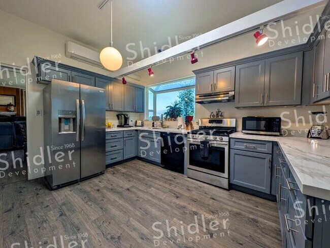 Building Photo - The Bridge House - 2 Bed 1 Bath with Uncompromising Views