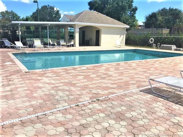 Building Photo - 3486 SW Pindo Palm Ln