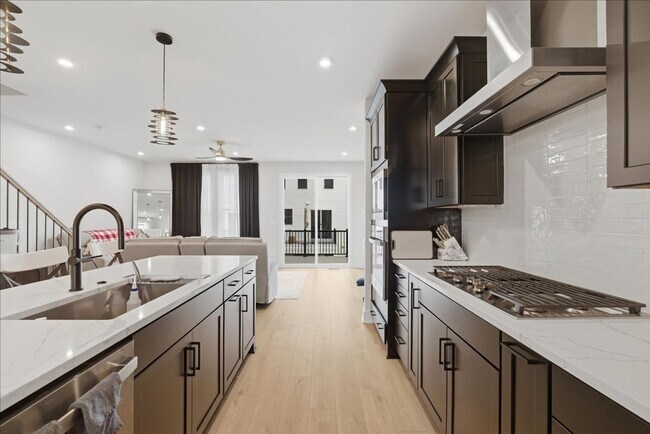 Building Photo - Welcome to this stunning, newly built 2025 townhome nestled in the heart of Brambleton