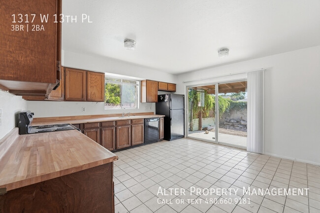 Building Photo - 1317 W 13th Pl