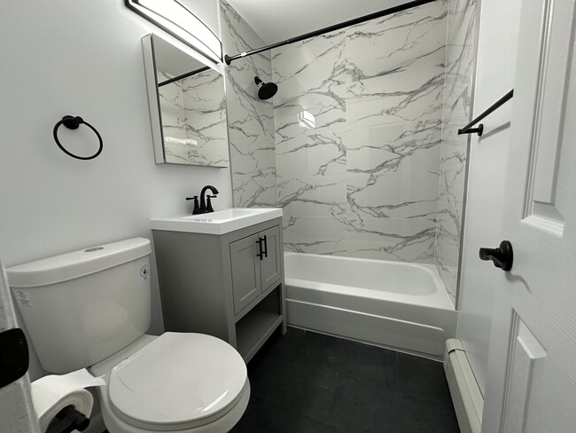 Custom Tiled Bathroom - Riverhill Apartments