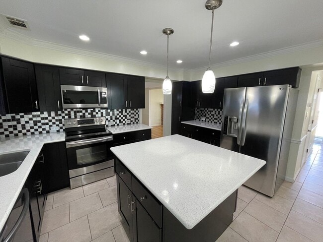 Building Photo - Beautifully updated home on large corner lot