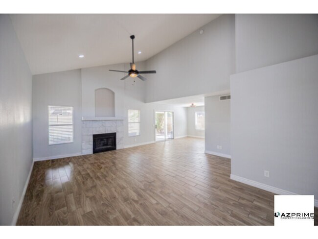 Building Photo - From The Moment You Arrive, This Gorgeous Remodeled 3/2.5 Peoria Home Captivates With Its Sun-Drench