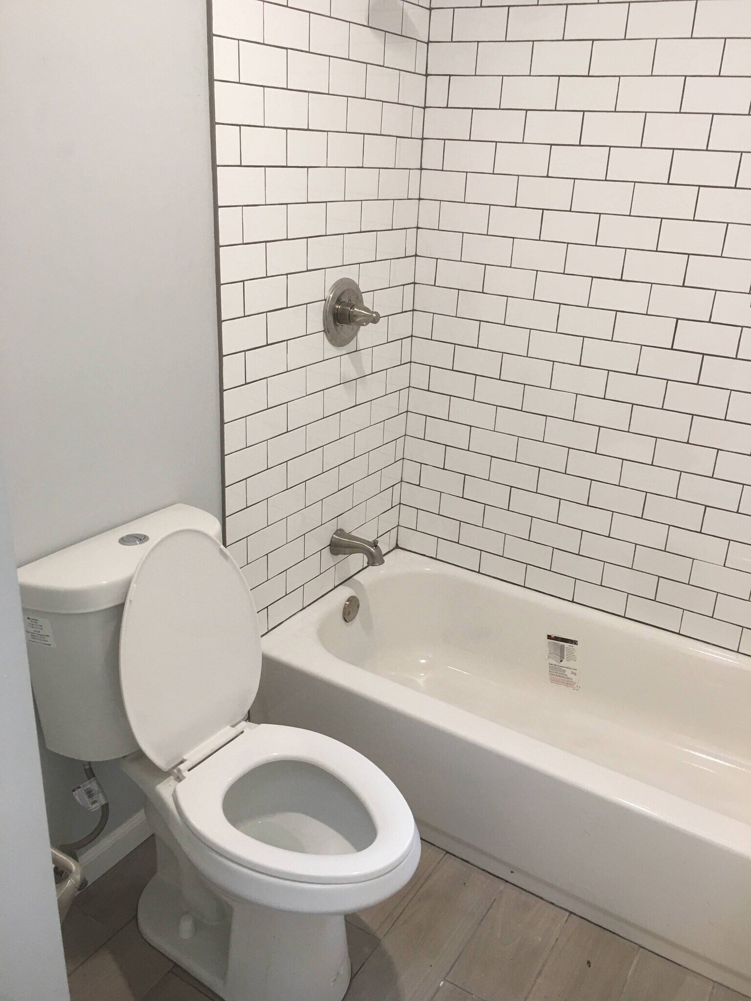 Main bathroom includes beautifully renovated shower surround. - 12 Mill Street