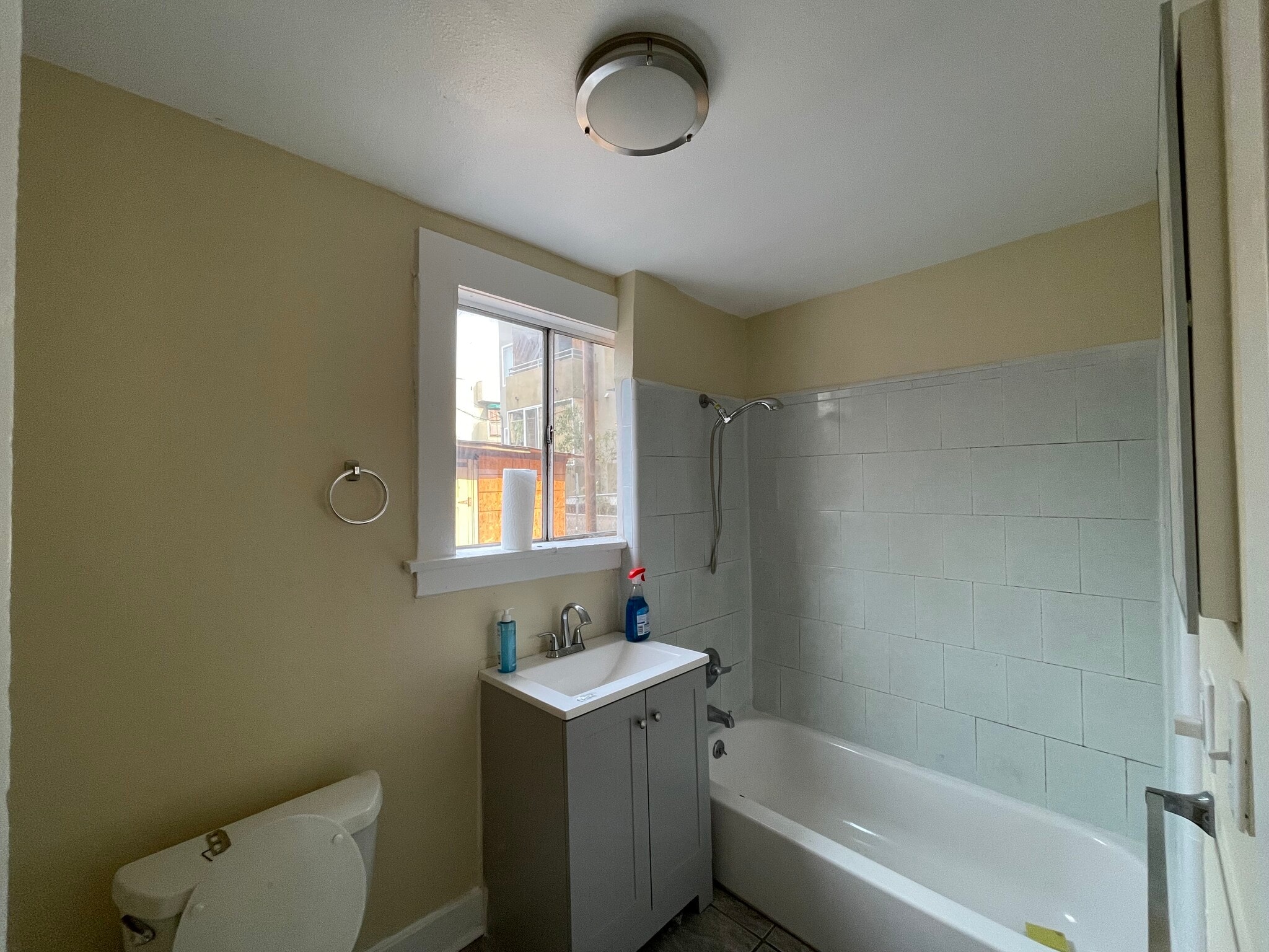 Updated bathroom with new amenities - 1120 S Berendo St