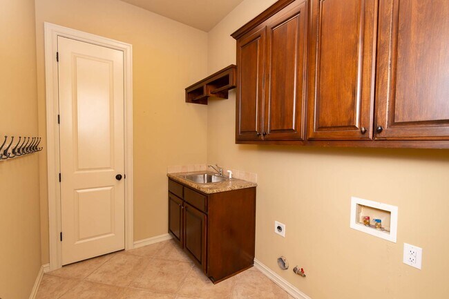 Building Photo - Rare lease opportunity in the exclusive ga...