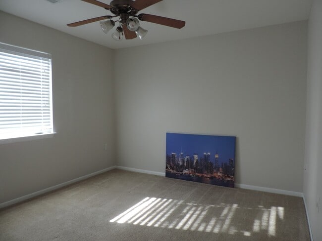 Building Photo - UPDATED KITCHEN! NEW PAINT! FENCED BACKYARD!