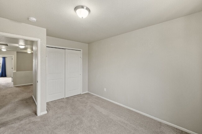 Building Photo - "Beautiful Townhome 3-Bedroom  2.5 Baths no carpet home, just 7 minutes from Fort Carson!"