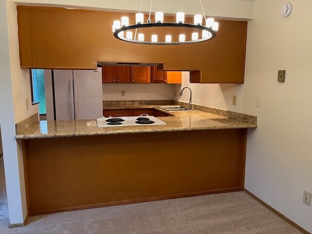Kitchen viewed from livingroom - 260 3rd Ave NE