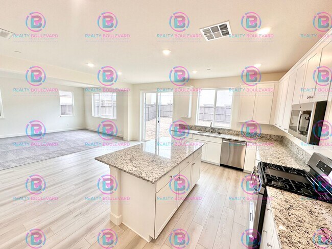 Building Photo - Modern Elegance: Stunning  New 4-Bedroom Home with Chef’s Kitchen & Dual Living Spaces