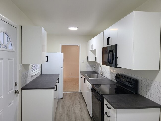 Building Photo - Charming 3BR House in University Hills