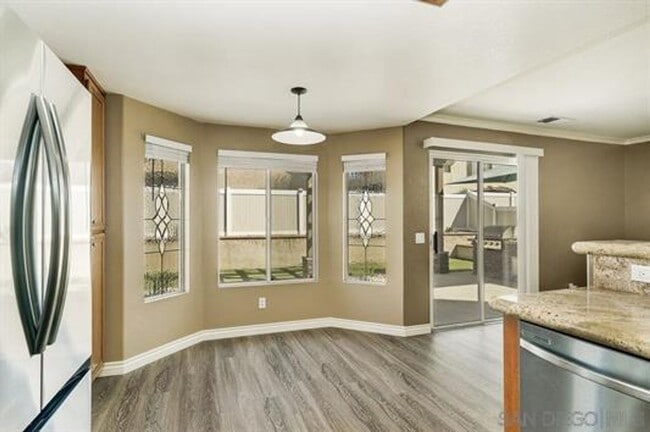 Building Photo - Beautifully Remodeled Home with outdoor Kitchen and Spa!