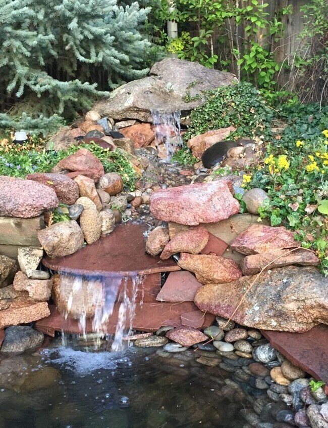 Building Photo - 4BR/4BA Updated Home with Finished Basement Suite & Landscaped Yard