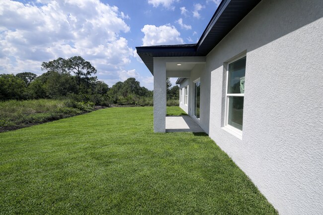 Building Photo - BRAND NEW MODERN SF HOME  3BD+den/2BA with GARAGE  IN LEHIGH ACRES!