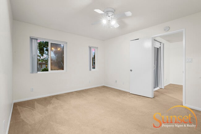 Building Photo - 7565 Charmant Dr