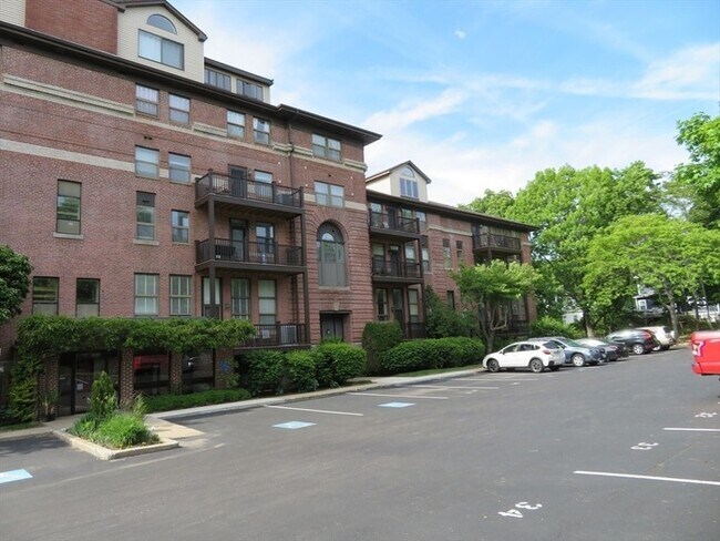 Building Photo - Updated 2BR / 2BA Condo with Private Deck & In-Unit Laundry at Academy Park