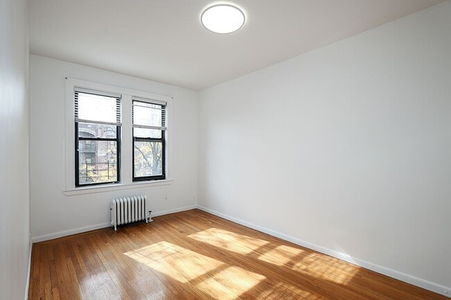 Building Photo - 11525 Metropolitan Avenue, 233