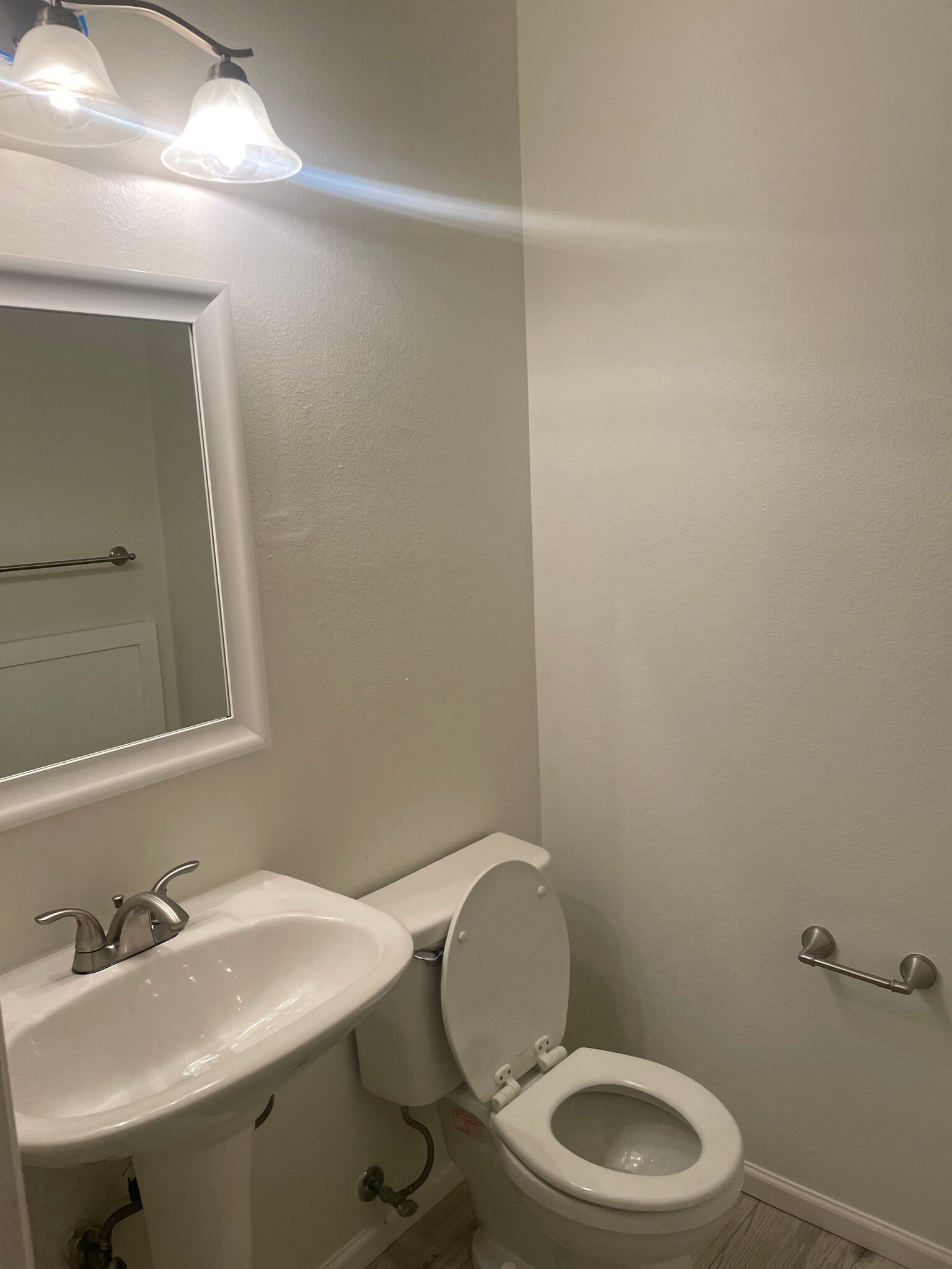 Main floor half bath - 8419 Stonybridge Cir