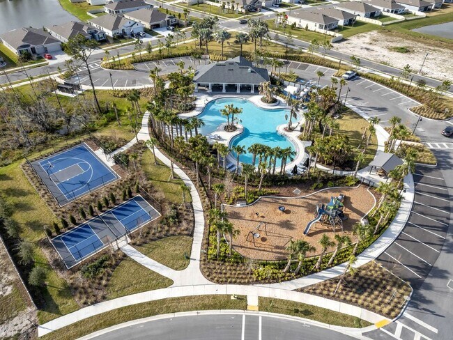 Building Photo - Stunning 4-Bedroom Home with Pond Views in...