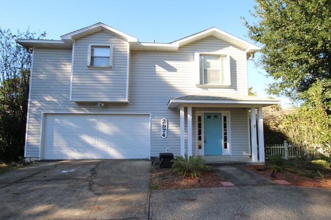 Building Photo - Live the Gulf Breeze Waterfront Life – Dock, Canal Access & Boat Lift!