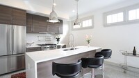 Gourmet kitchen with beautiful natural light - The Diplomat